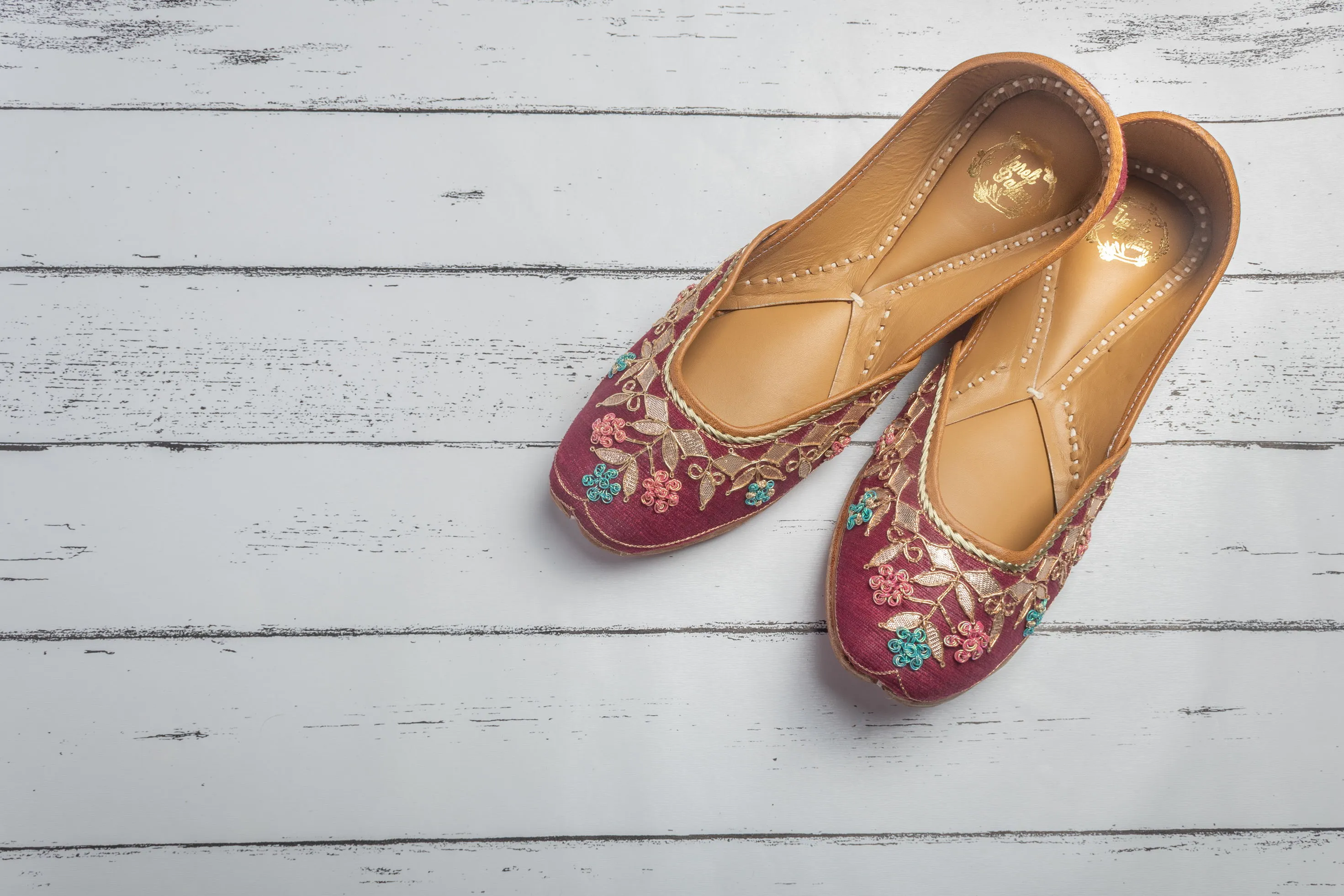carmine red Hand embroidered Juttis