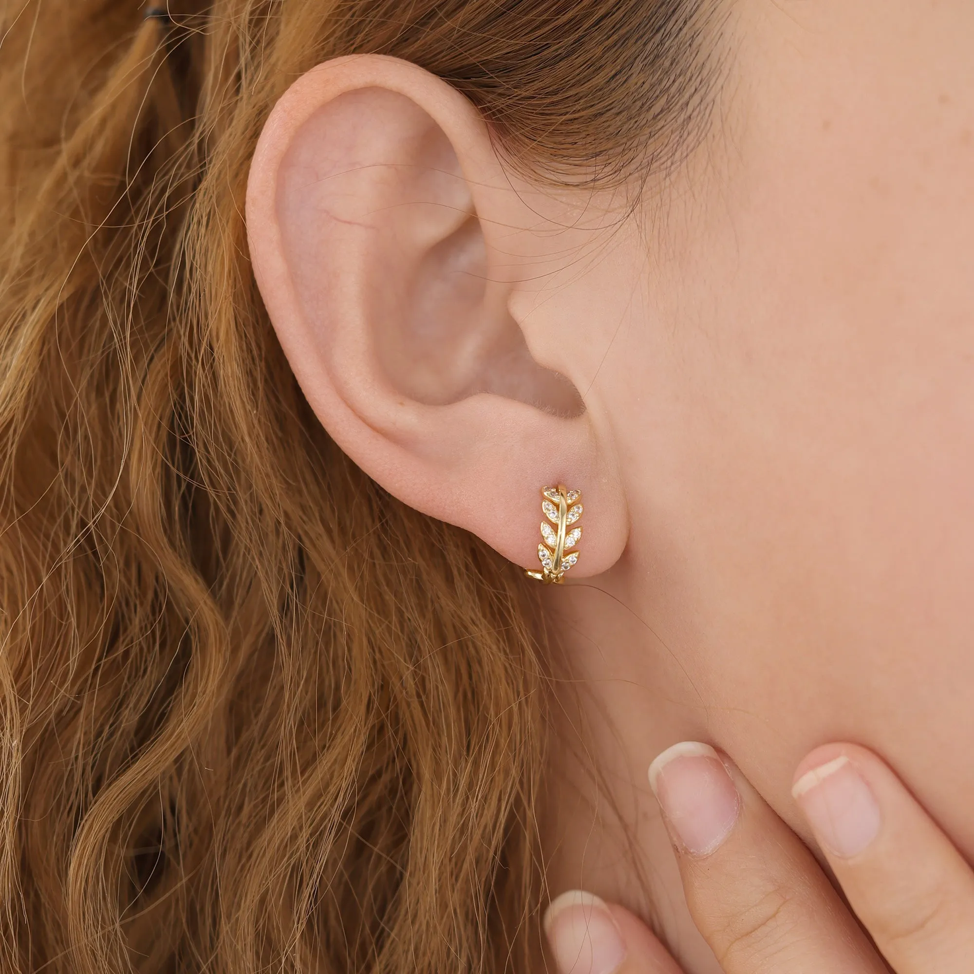 E043 gold leaf huggie hoop earrings